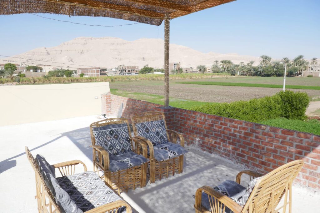 Green brick house for sale in the western part of Luxor, El Kom area